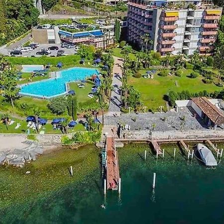 Appartamento Con Piscina E Sauna Bissone Bagian luar foto