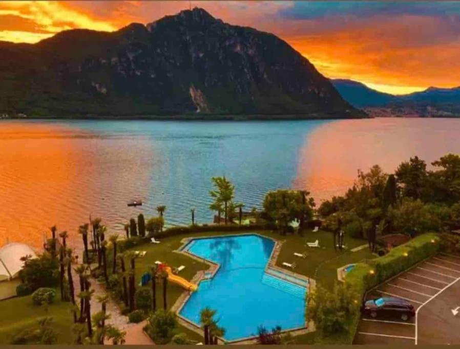 Appartamento Con Piscina E Sauna Bissone Bagian luar foto