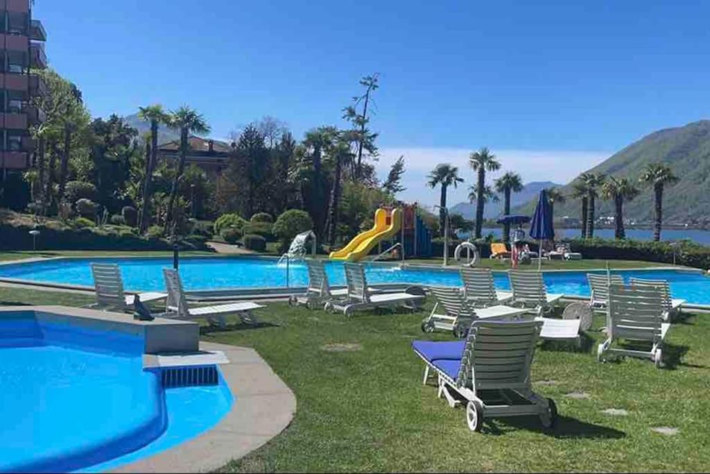 Appartamento Con Piscina E Sauna Bissone Bagian luar foto